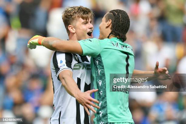 Jaka Bijol of Udinese Calcio celebrates with teammate Marco Silvestri after victory in the Serie A match between Udinese Calcio and FC Internazionale...