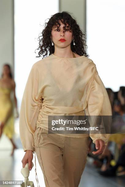 Model walks the runway during the Rejina Pyo show during London Fashion Week September 2022 on September 18, 2022 in London, England.