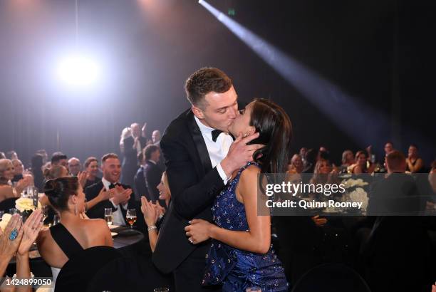 Patrick Cripps of the Blues celebrates with partner Monique Fontana as he is announced the winner of the Brownlow Medal during the 2022 Brownlow...