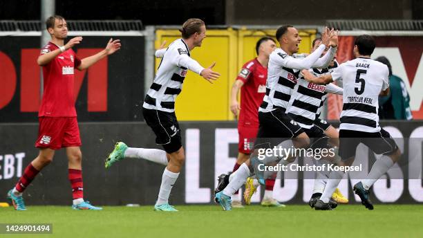 Michel Julius Stoecker of Verl celebrates the first goal with his team mates during the 3. Liga match between SC Verl and MSV Duisburg at Home Deluxe...