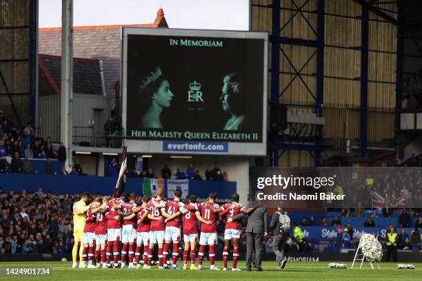 Both teams stand for a minute of silence in memory of Her Majesty Queen Elizabeth II, who passed away at Balmoral Castle on September 8, 2022 prior...
