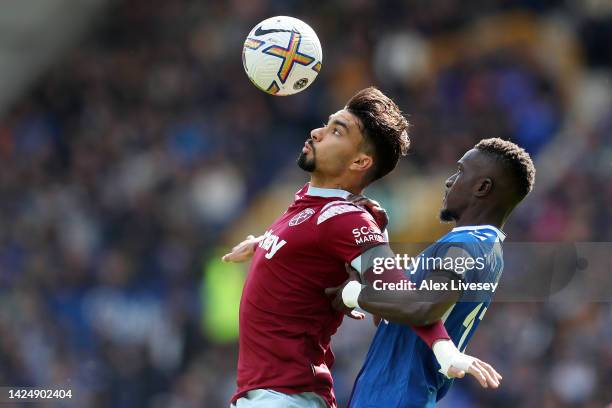 Lucas Paqueta of West Ham United holds off Idrissa Gueye of Everton FC during the Premier League match between Everton FC and West Ham United at...