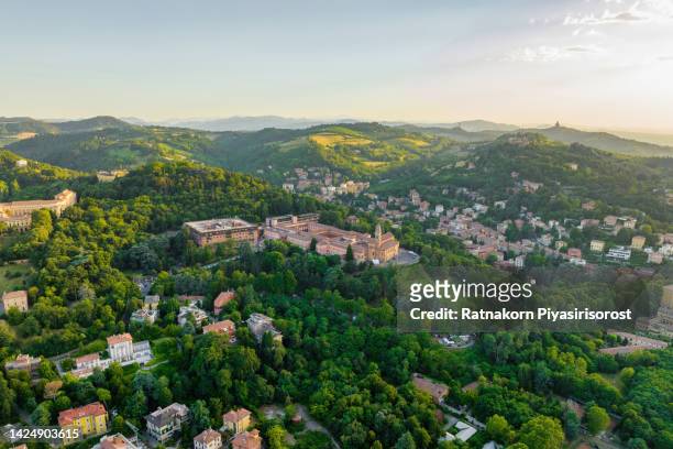 aerial drone sunset scene of bologna historic center and due torri towers, the two towers both of them leaning, are the symbol of bologna, italy - emilia-romagna stock pictures, royalty-free photos & images
