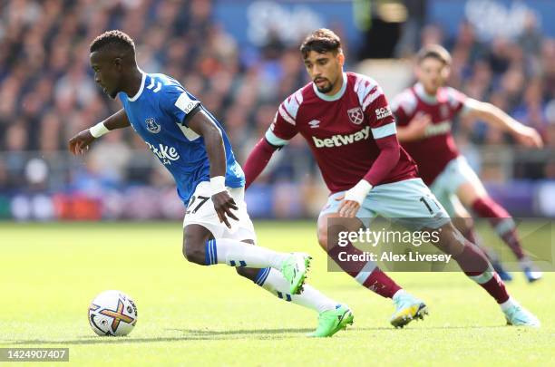 Idrissa Gueye of Everton FC on the ball whilst under pressure from Lucas Paqueta of West Ham United during the Premier League match between Everton...