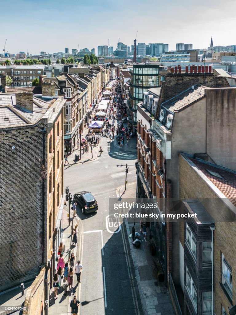 London - Brick Lane, the famous street in the east of London from a drone perspective