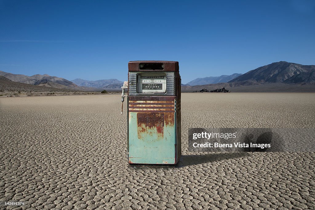 Rusty gas pump in a desert