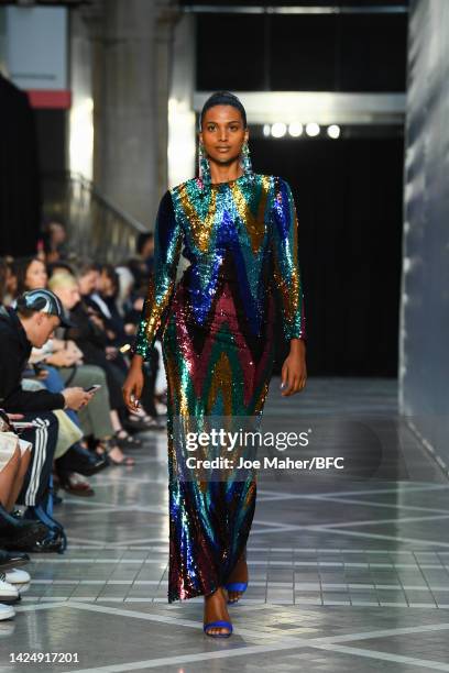 Model walks the runway at the Halpern show during London Fashion Week September 2022 on September 18, 2022 in London, England.