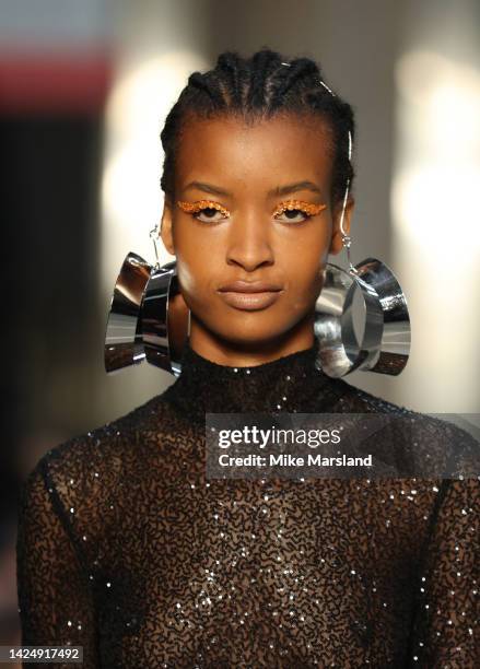 Model walks the runway at the Halpern show during London Fashion Week September 2022 on September 18, 2022 in London, England.