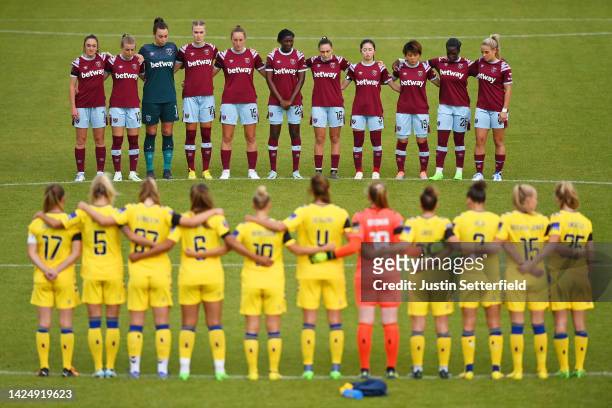 Both teams stand for a minute of silence in memory of Her Majesty Queen Elizabeth II, who passed away at Balmoral Castle on September 8, 2022 prior...