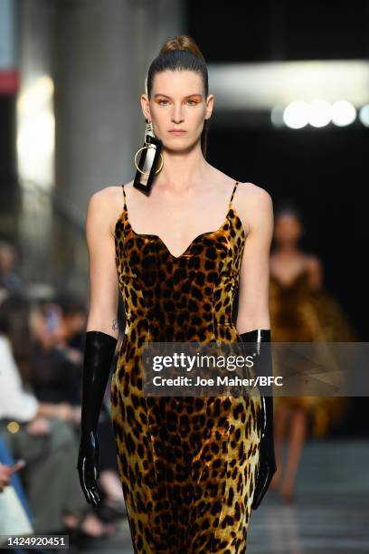 Model walks the runway at the Halpern show during London Fashion Week September 2022 on September 18, 2022 in London, England.