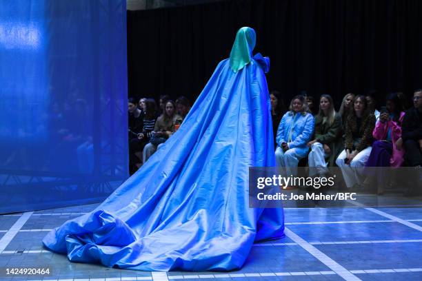 Model walks the runway at the Halpern show during London Fashion Week September 2022 on September 18, 2022 in London, England.