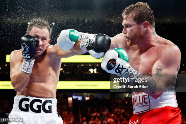 Canelo Alvarez and Gennadiy Golovkin exchange punches in the fight for the Super Middleweight Title at T-Mobile Arena on September 17, 2022 in Las...