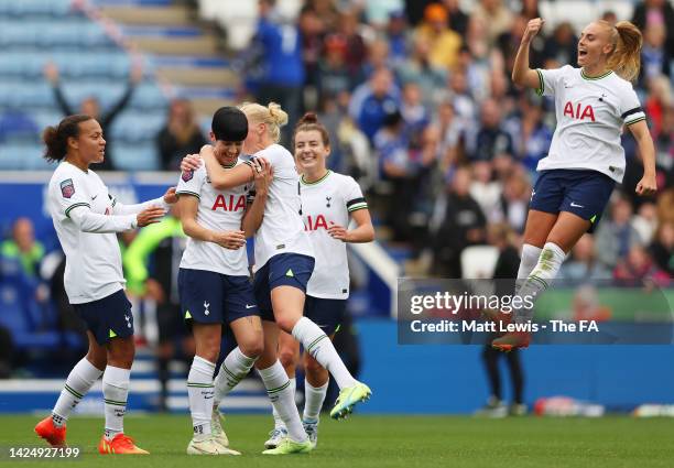 Ashleigh Neville of Tottenham Hotspur celebrates with teammates after scoring their team's first goal during the FA Women's Super League match...