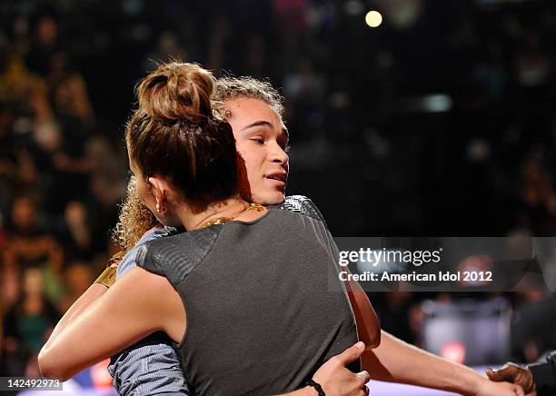 Eliminated contestant DeAndre Brackensick and judge Jennifer Lopez onstage at FOX's "American Idol" Season 11 Top 8 To 7 Live Elimination Show on...