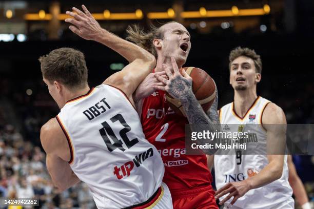 Aleksander Roman Olek Balcerowski of Poland against Andreas Obst of Germany during the FIBA EuroBasket 2022 3rd place match between Germany v Poland...