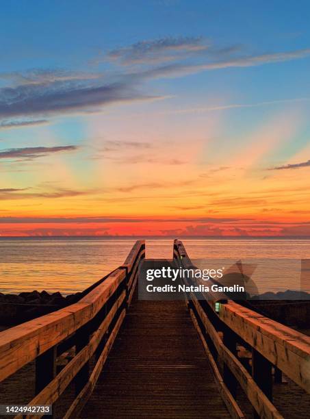 walkway to the sunrise - jekyll island stock pictures, royalty-free photos & images