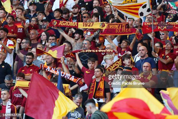 Roma fans raise scarves as they show their support prior to the Serie A match between AS Roma and Atalanta BC at Stadio Olimpico on September 18,...