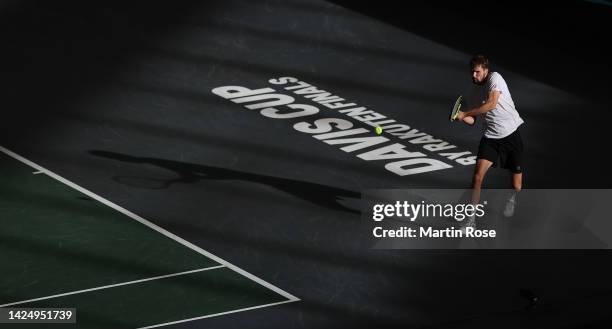 Oscar Otte of Germany plays a backhand against Thanasi Kokkinakis of Australia during the Davis Cup Group Stage 2022 Hamburg match between Germany...