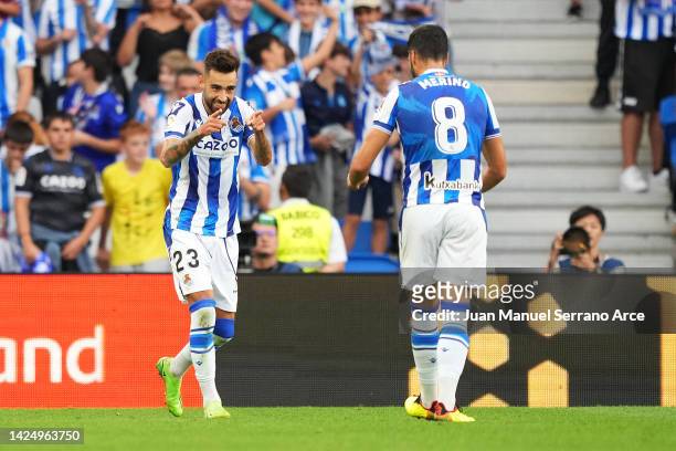 Brais Mendez of Real Sociedad celebrates with teammate Mikel Merino after scoring their team's second goal during the LaLiga Santander match between...