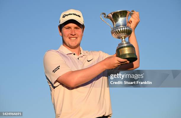 Robert MacIntyre of Scotland celebrates with the trophy after winning The Italian Open on Day Four of the DS Automobiles Italian Open 2022 at Marco...