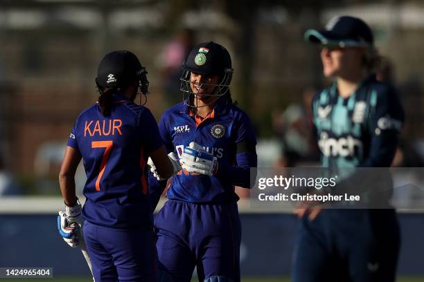 Smriti Mandhana of India and Harmanpreet Kaur of India during the 1st Royal London ODI match between England and India at The 1st Central County...