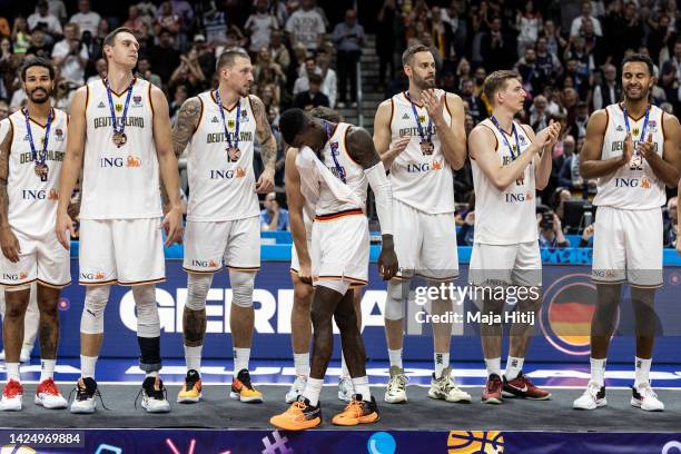 Dennis Schroder of Germany and team celebrate after winning bronze medal after the FIBA EuroBasket 2022 3rd place match between Germany v Poland at...