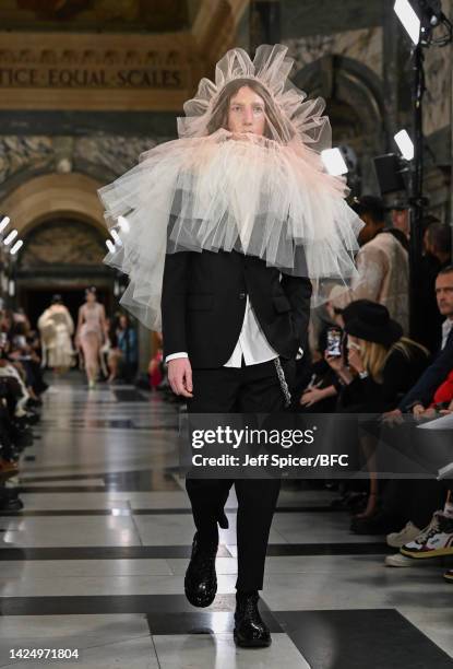 Model walks the runway during the Simone Rocha show during London Fashion Week September 2022 on September 18, 2022 in London, England.