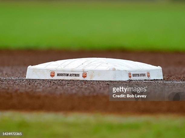 General view of a Houston Astros 60th Anniversary logo on the first base bag as the Oakland Athletics play the Houston Astros at Minute Maid Park on...