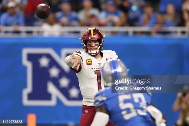 Carson Wentz of the Washington Commanders passes the ball against the Detroit Lions during the first quarter at Ford Field on September 18, 2022 in...