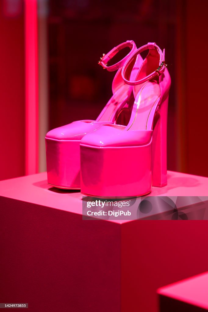 Vibrant pink platform high heeled shoes