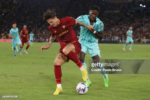 Nicolo Zaniolo of AS Roma holds off Ederson of Atalanta during the Serie A match between AS Roma and Atalanta BC at Stadio Olimpico on September 18,...