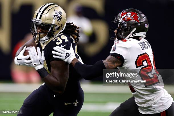 Tony Jones Jr. #34 of the New Orleans Saints runs past Carlton Davis III of the Tampa Bay Buccaneers during the second quarter of the game at Caesars...