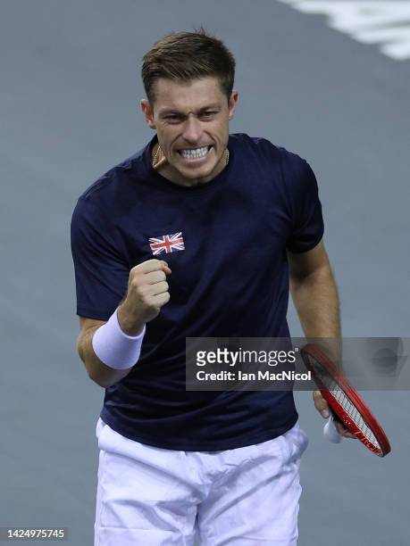 Neal Skupski of Great Britain reacts as he wins the first set with playing partner Joe Salisbury of Great Britain during the Davis Cup Group D match...
