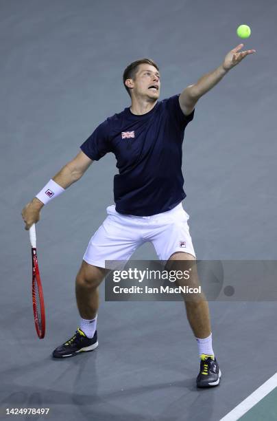 Neal Skupski of Great Britain serves a point in the second set during the Davis Cup Group D match between Great Britain and Kazakhstan at Emirates...