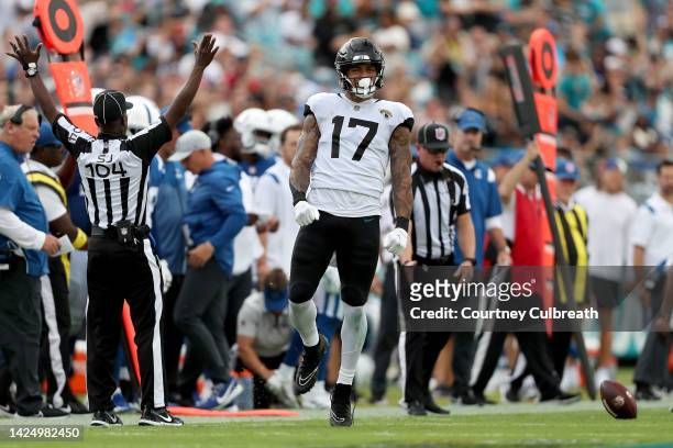 Evan Engram of the Jacksonville Jaguars reacts after a first down in the second quarter against the Indianapolis Colts at TIAA Bank Field on...