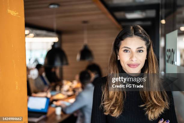 portrait of a young businesswoman at the office - portrait of cool creative businesswoman at office bildbanksfoton och bilder