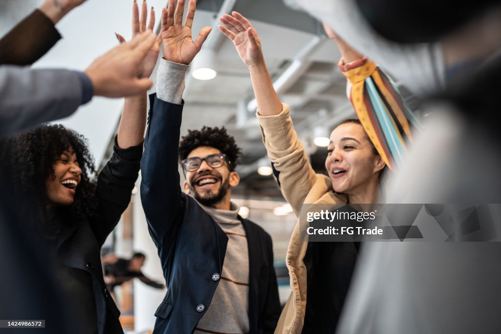 Coworkers celebrating at the office