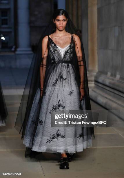 Model walks the runway at the Erdem show during London Fashion Week September 2022 on September 18, 2022 in London, England.