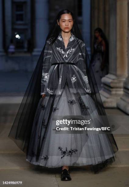 Model walks the runway at the Erdem show during London Fashion Week September 2022 on September 18, 2022 in London, England.