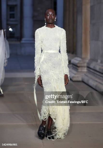 Model walks the runway at the Erdem show during London Fashion Week September 2022 on September 18, 2022 in London, England.