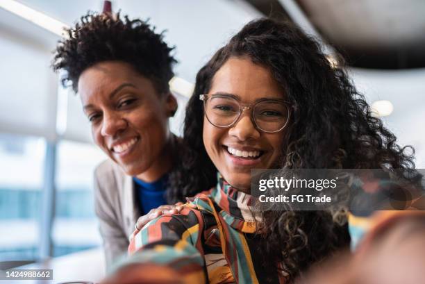 selfie of coworkes in the office - camera point of view - camera point of view stock pictures, royalty-free photos & images