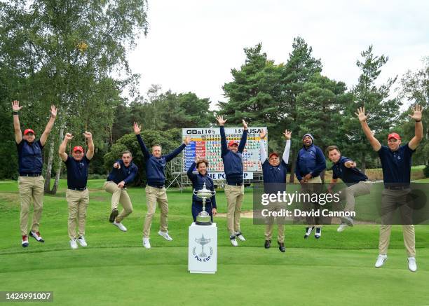 The United States team leap for joy in celebration with their captain Suzy Whaley with the PGA Cup trophy after their 15.5 - 10.5 overall match...