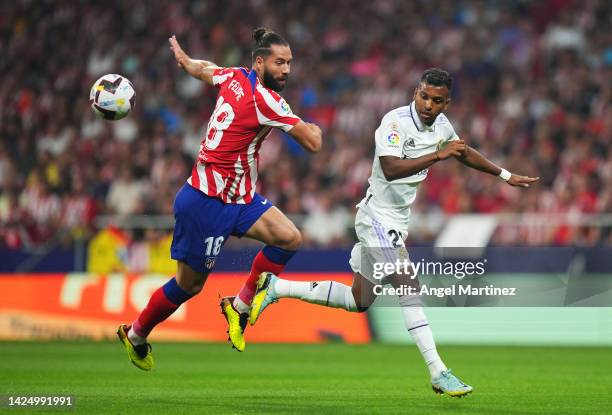 Felipe of Atletico de Madrid battles for possession with Rodrygo of Real Madrid during the LaLiga Santander match between Atletico de Madrid and Real...