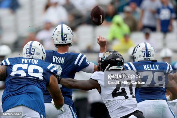 Josh Allen of the Jacksonville Jaguars forces a fumble against Matt Ryan of the Indianapolis Colts in the second quarter at TIAA Bank Field on...