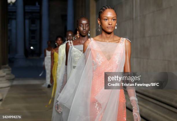 Models walk the runway at the finale of the Erdem show during London Fashion Week September 2022 on September 18, 2022 in London, England.
