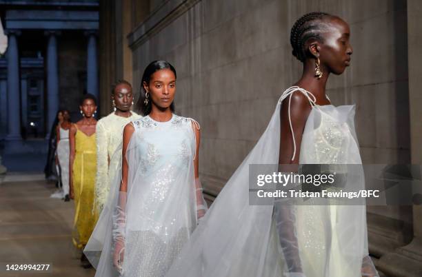 Models walk the runway at the finale of the Erdem show during London Fashion Week September 2022 on September 18, 2022 in London, England.