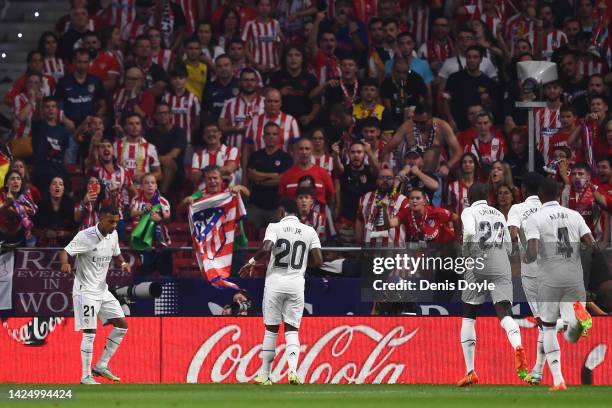 Rodrygo of Real Madrid celebrates after scoring their team's first goal during the LaLiga Santander match between Atletico de Madrid and Real Madrid...