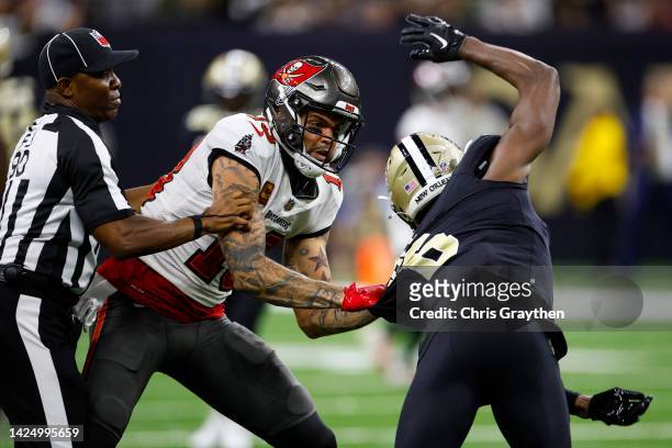 Marcus Maye of the New Orleans Saints argues with Mike Evans of the Tampa Bay Buccaneers on the field during the second half of the game at Caesars...