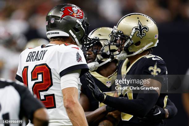 Tom Brady of the Tampa Bay Buccaneers and Marshon Lattimore of the New Orleans Saints argue during the fourth quarter of the game at Caesars...