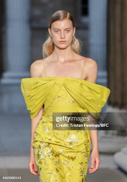 Model walks the runway at the Erdem show during London Fashion Week September 2022 on September 18, 2022 in London, England.